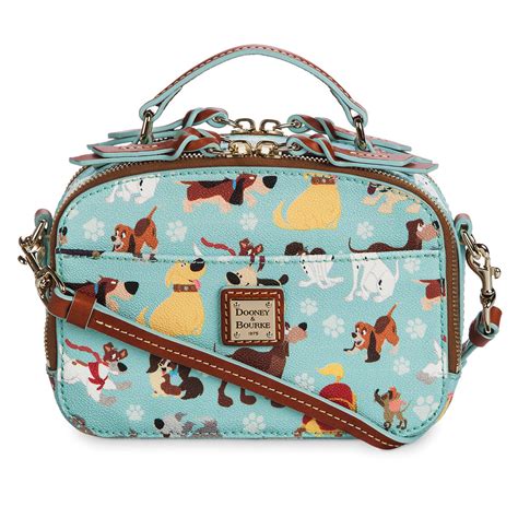 The newest Disney Dooney and Bourke Bag to feature Winnie the Pooh highlights Pooh, Eeyore, and Piglet on a pink background, playing in the flowers. . Dooney  bourke dog purse